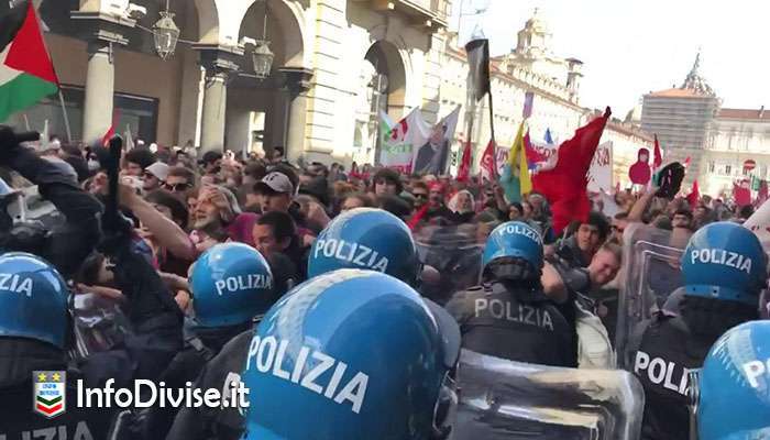 Vernice, sputi e 10 agenti contusi. Tensione e scontri al corteo del 1 Maggio a Torino