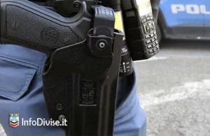 Poliziotto cede pistola d'ordinanza